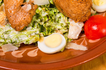 Grilled meat salad with tomatoes.