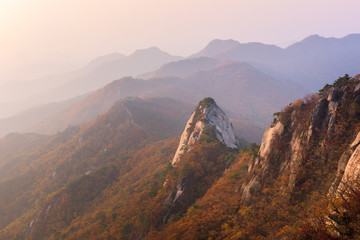 Fototapeta premium sunrise of Baegundae peak, Autumn Season at Bukhansan mountains
