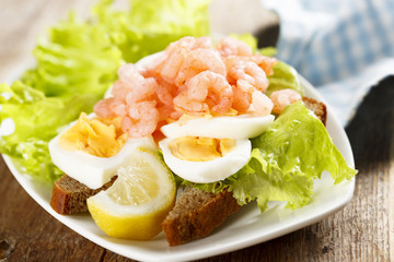 Sandwich with boiled egg and shrimps