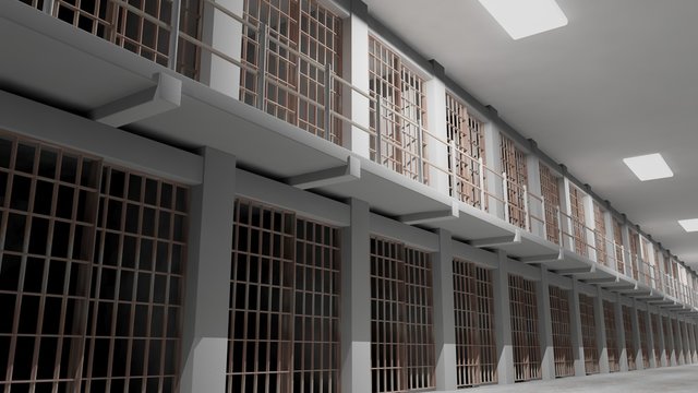 Rows of prison cells, prison interior.
