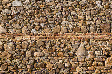 Old weathered stone wall texture