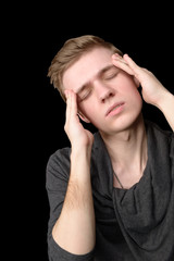 Young man with a headache