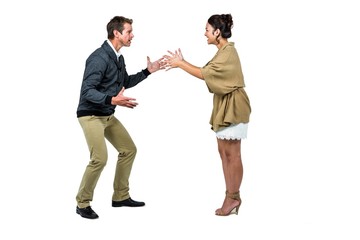 Full length of couple arguing