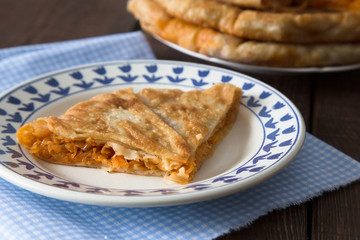 pie with filling is stewed cabbage with egg. Moldovan cuisine