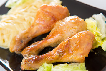 fried chicken and macaroni on a plate