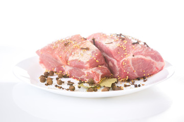 piece of raw meat with spices