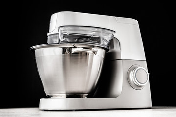 Food processor on the black background horizontal