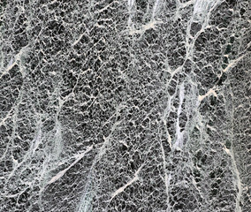 Black and white veins in stone marble texture