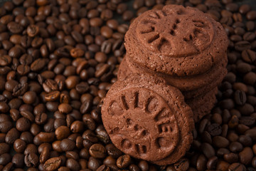 Homemade chocolate cookies on the coffee beans