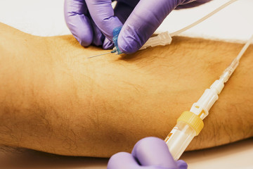 patient giving blood sample