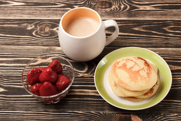 sweet pancakes with strawberry and coffee