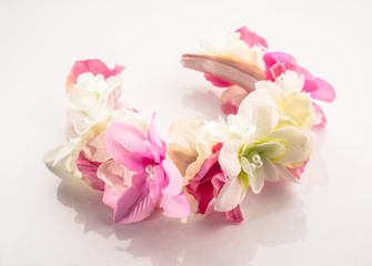 Obraz na płótnie Canvas Flowers headband isolated on a white background