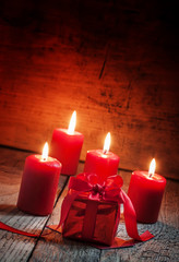 Gift for Valentine's Day in a red box with a red ribbon 