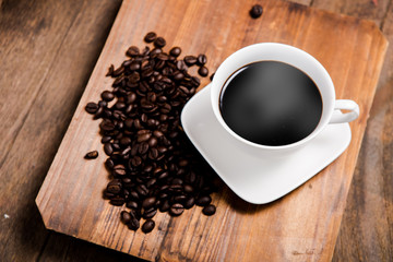 cup of coffee and coffee bean