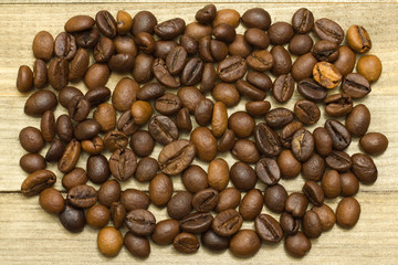 coffee beans on wooden background