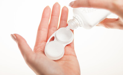Contact lens with case and bottle healthcare concept