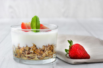 Yogurt with cereals and strawberries
