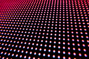 Texture of colored LED lights on a black background