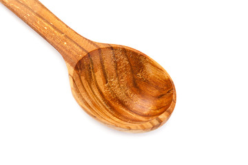 Wooden spoonon white background.