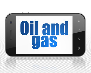 Manufacuring concept: Smartphone with Oil and Gas on display