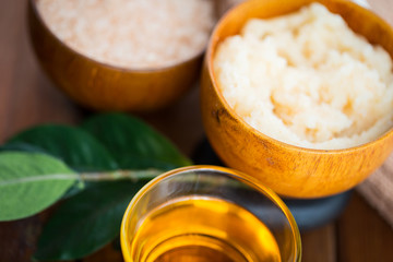 close up of body scrub in wooden bowl