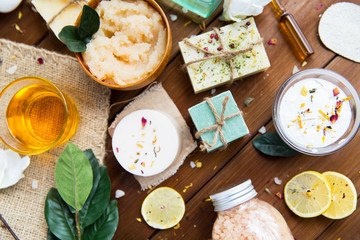 close up of body care cosmetic products on wood