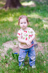 Beautiful baby girl playing outdoor