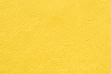 yellow creased tissue paper background