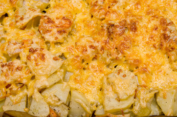 Homemade baked potatoes with cheese