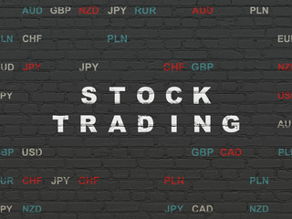 Finance concept: Stock Trading on wall background