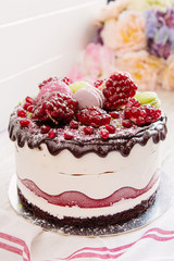 Pomegranate cake with chocolate glaze