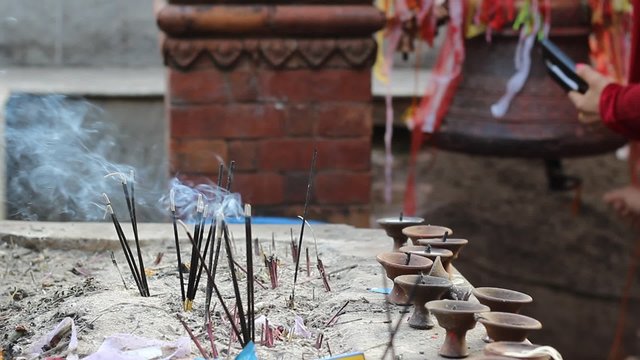 Fragrant sticks and candles in Hindu tample