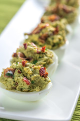 Bacon guacamole deviled eggs