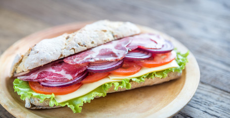 Sandwich with ham, cheese and fresh vegetables