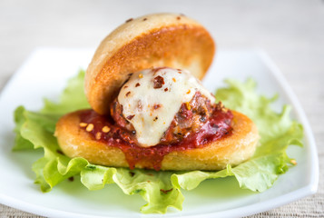 Sandwich with meatball in tomato sauce and mozzarella