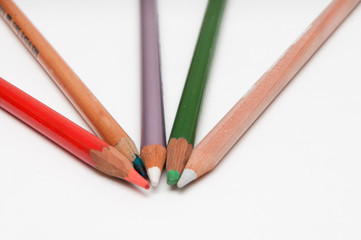 Naklejka premium Five pencils on white