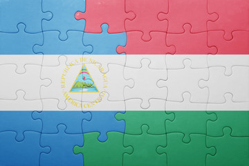 Fototapeta premium puzzle with the national flag of azerbaijan and hungary