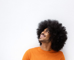 Fototapeta na wymiar Afro man smiling and looking up