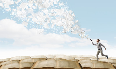 Obraz premium Man running with book