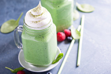 Green smoothie with whipped topping