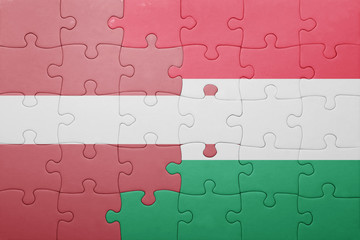 puzzle with the national flag of latvia and hungary