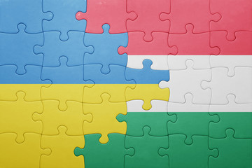 puzzle with the national flag of ukraine and hungary