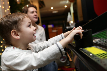 Child playing shooting game