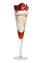 cup ice cream with strawberries and cream, cropped in still life
