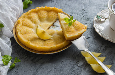 Lemon cake with mint and Cup of tea