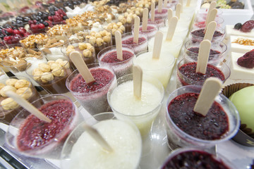 mini ice cream with various colors in the glasses