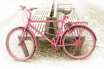 pink bike on a snowy street