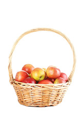 Fresh apples in basket isolated on a white