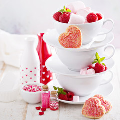 Valentines day sugar cookies in stacked cups