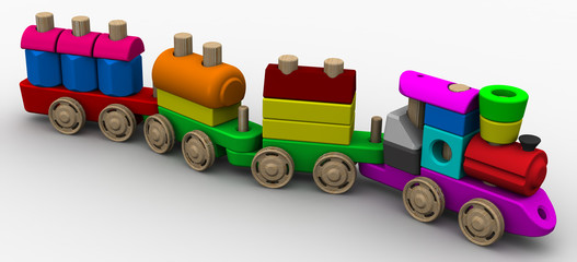 Colorful wooden toy train on a white surface. Isolated